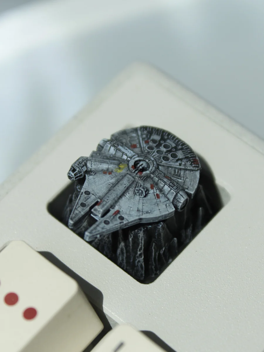 Iconic Star Wars resin artisan keycaps showcasing detailed starship replicas. These premium, handcrafted Star Wars keycaps capture cinematic legends.