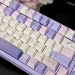 Close-up views of Dreamy Starry Sky Keycaps Set, showcasing the celestial PBT dye-sub set with swirling nebulae and distant stars from multiple artistic angles.
