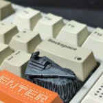 Close-up views of premium Star Wars Spaceship Artisan Resin Keycaps, highlighting authentic, detailed miniature replicas of iconic Star Wars vessels.