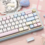 Sugar Weave Summer Series Keycap Set detail the 'Sugar Woven Summer' design. Delicate pastels and dreamy summer motifs create a tranquil aesthetic.