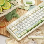 Whimsical Sumikko Gurashi PBT Dye-Sub keycaps set, showcasing adorable pastel characters from various angles, bringing playful charm to your keyboard.