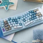 Bright and playful Whimsical Summer Kitty PBT Dye-Sub Keycap Set, showcasing adorable cat designs and subtle transparent accents to enhance your desk.