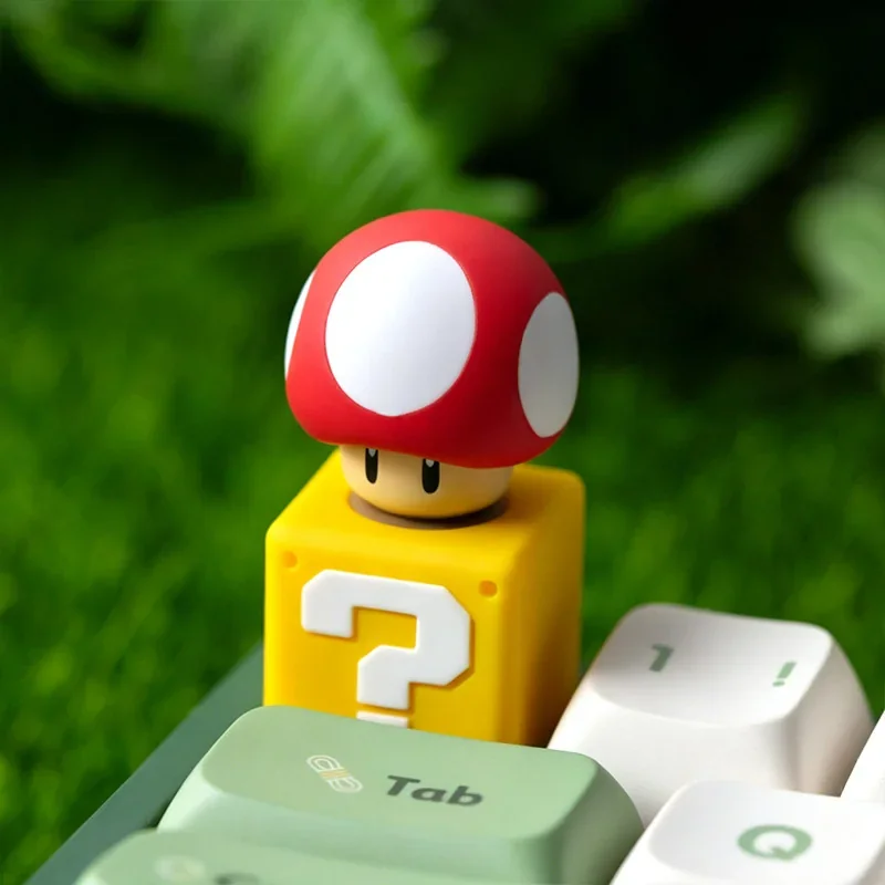 Vibrant Super Mario Super Mushroom rotating resin keycap, a playful 3D sculpture capturing iconic game aesthetics for mechanical keyboards.