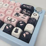Playful PBT Sweetheart Black Cat Keycap Set showcasing whimsical black cat motifs and heart accents across its smooth MOA profile.