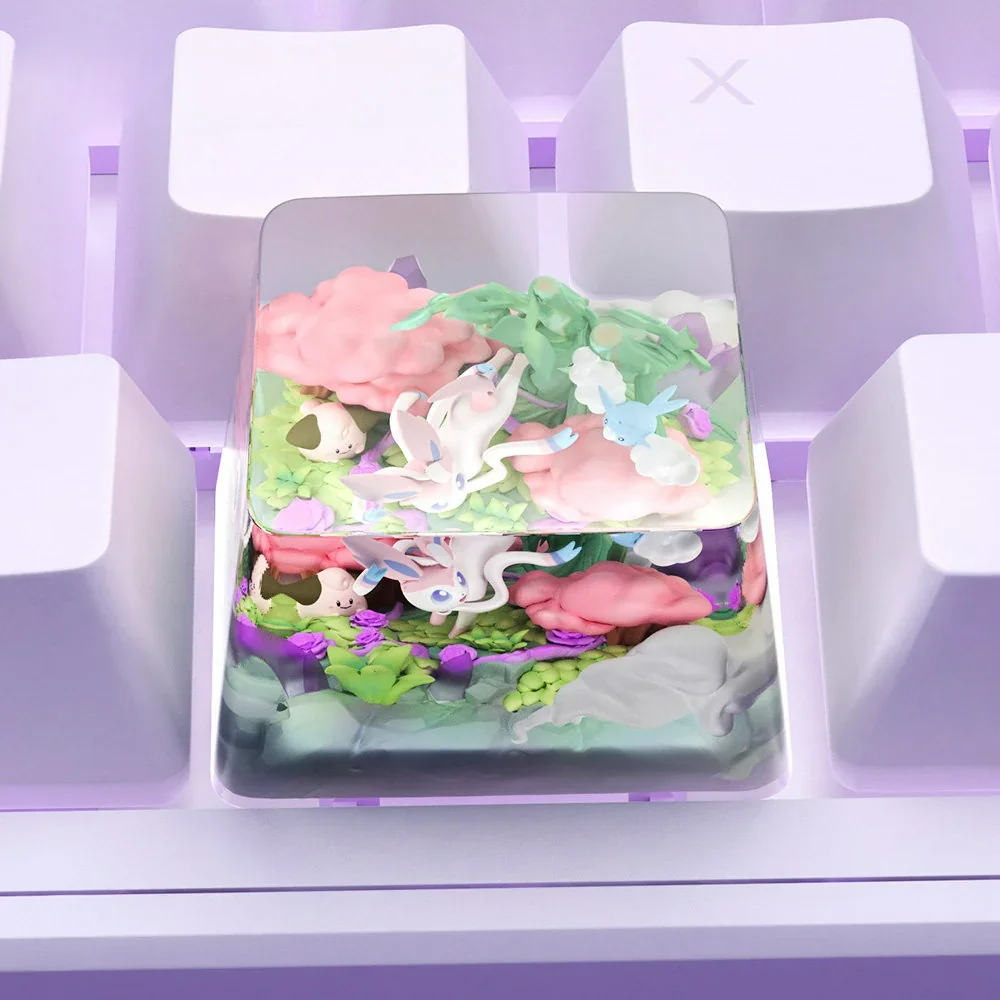 Pokemon: Sylveon & Friends Transparent Keycap, featuring exquisite artisan keycaps displayed in a pastel miniature world.