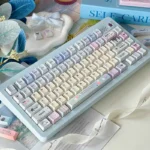 Dreamy Tipsy Bubbles PBT Dye-Sub Keycaps Set. Artistic view: soft pastel gradients, ethereal bubble patterns on quality PBT keycaps.