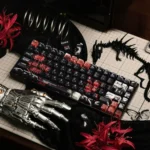 Main image of exclusive Tokyo Ghoul Ken Kaneki side-printed shine-through PBT keycaps set, capturing the dark anime aesthetic with luminous legends.