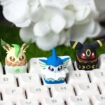 Artistic close-up of the handcrafted Umbreon 'Cake' artisan keycap, revealing intricate sculpting and charming, sweet details on this unique Pokemon.