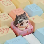 Close-up views of vibrant, handcrafted Valorant agent ESC keycaps, showcasing intricate details and artistic design from multiple angles.