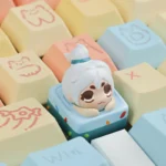 A collection of handcrafted Valorant agent ESC keycaps, showcasing vibrant, stylized designs from various angles, highlighting meticulous gaming art.