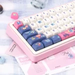 Close-up of vibrant Dopamine PBT dye-sub keycaps set, showcasing crisp legends and playful high-contrast colors in an ergonomic profile.