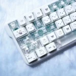 Adorable Miffy PBT shine-through keycaps set. Clean white PBT, Miffy art, transparent side legends from various angles, exuding whimsical charm.