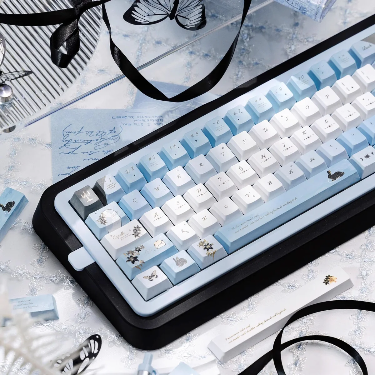 Wild Lily Notebook PBT and transparent PC keycaps set, displaying delicate flora, vintage journal motifs, and unique transparent accents.