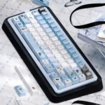 Close-up of Wild Lily Notebook PBT & Transparent PC Keycaps set, showcasing delicate floral designs and vintage journal motifs on premium PBT.