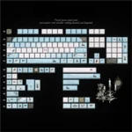 Wild Lily Notebook PBT & Transparent PC keycaps set, 145 keys in a premium box with keycap puller, showcasing unique nature-inspired floral designs.