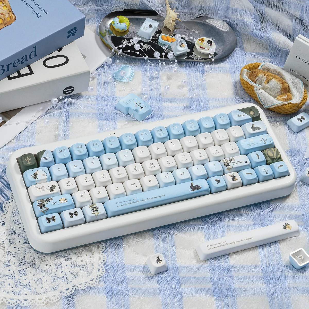 Wild Lily Notebook PBT & Transparent PC Keycaps set, with delicate floral and vintage journal designs. Premium Wild Lily Keycaps add artistic elegance.