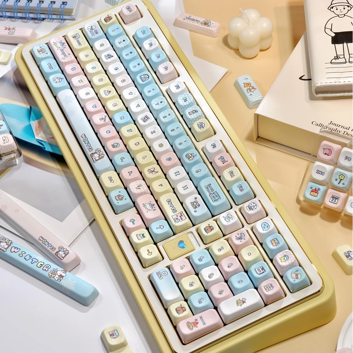 Serene Winter PBT Keycap Set. Durable PBT and crisp dye-sub legends in cool hues. An artistic view of its calm winter aesthetic.