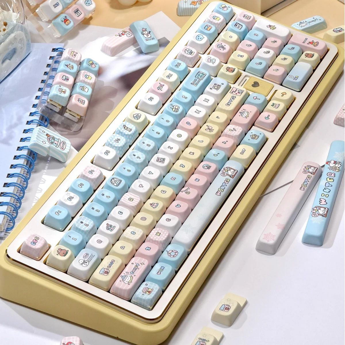 Complete 145-key Serene Winter PBT keycap set, with durable dye-sub legends in cool hues, creating a tranquil, immersive aesthetic.