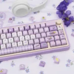Whimsical Wishing Rabbit PBT dye-sub keycaps set from a different angle, showcasing dreamy pastel hues and intricate celestial bunny designs.