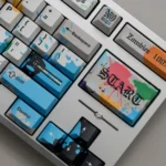 Exclusive Zom 100 Graffiti PBT Keycaps Set from various angles, displaying vibrant anime characters and rebellious street art for an artistic keyboard.