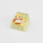 Handcrafted Camping Biscuit artisan ESC keycap. Whimsical miniature animal in a cozy camping scene, showcasing unique playful details and artistry.