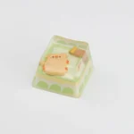 Handcrafted camping biscuit artisan keycap featuring a whimsical pig, perfect for a cozy, nature-inspired desk setup.