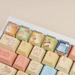 Whimsical handcrafted Camping Biscuit Artisan Keycap ESC featuring a charming miniature animal enjoying a cozy nature scene. Unique and artistic customization setup.