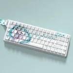 Vibrant Hatsune Miku PBT dye-sub keycaps set for mechanical keyboards, displaying iconic teal and digital pop art from a playful side-lit view.