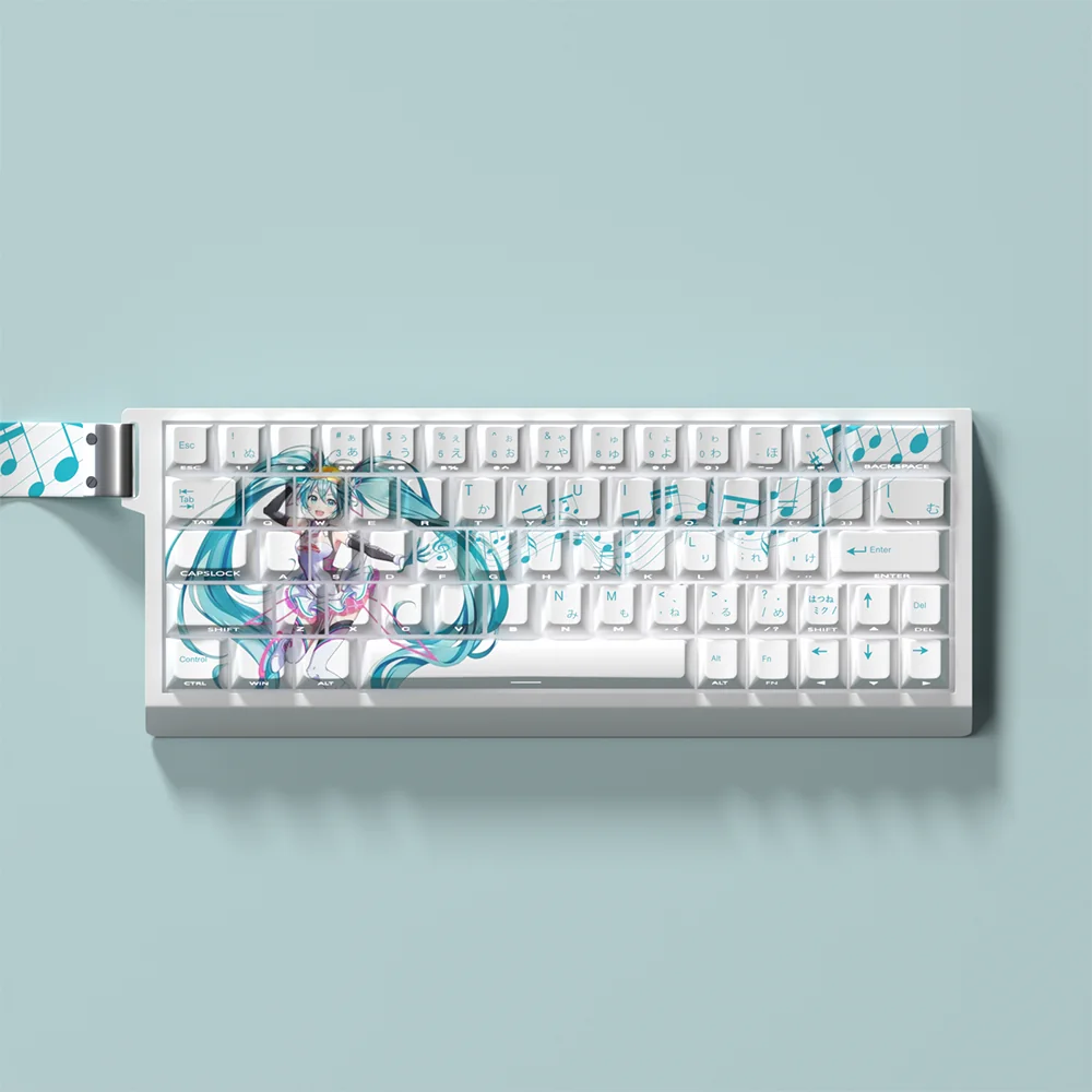 Exclusive Hatsune Miku PBT dye-sub keycaps set for mechanical keyboards, featuring vibrant teal and digital pop art and a playful side-lit design.