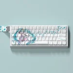 Vibrant Hatsune Miku PBT Dye-Sub Keycaps Set for mechanical keyboards, showcasing an exclusive set with iconic teal and pink digital pop art, perfect for fans.