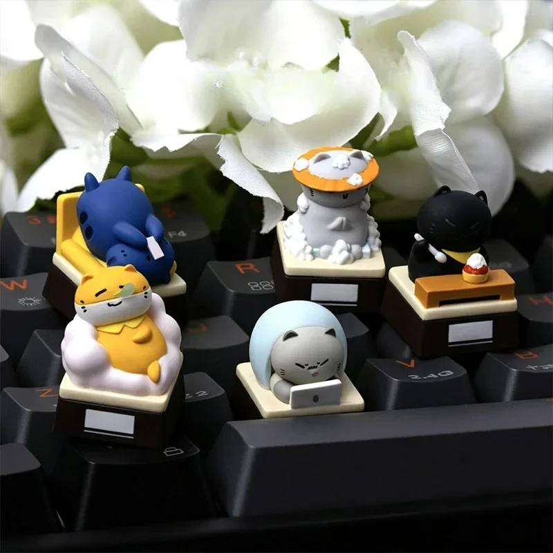 Whimsical handcrafted resin artisan cat keycap featuring an expressive feline illustrating a relatable work mood, perfect for keyboard enthusiasts.