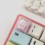 Close-up of a whimsical handcrafted resin animal sundae artisan keycap for ESC, showcasing its vibrant colors and intricate details from a playful design.
