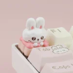 Close-up of a whimsical Fabu Rabbit Strawberry Pudding resin artisan keycap, showcasing its intricate handcrafted details and pastel dessert-inspired.