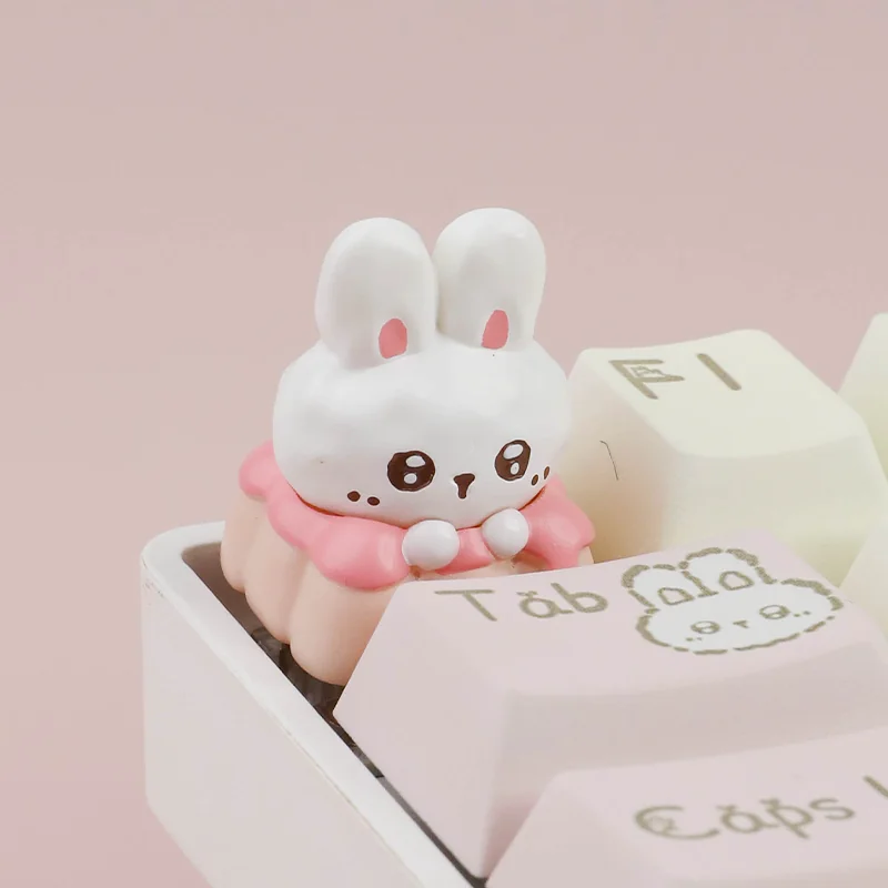 Close-up of a whimsical Fabu Rabbit Strawberry Pudding resin artisan keycap, showcasing its intricate handcrafted details and pastel dessert-inspired.