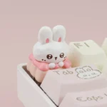 Handcrafted resin artisan keycap showcasing a whimsical Fabu Rabbit in a pastel strawberry pudding design, bringing adorable charm to your keyboard.