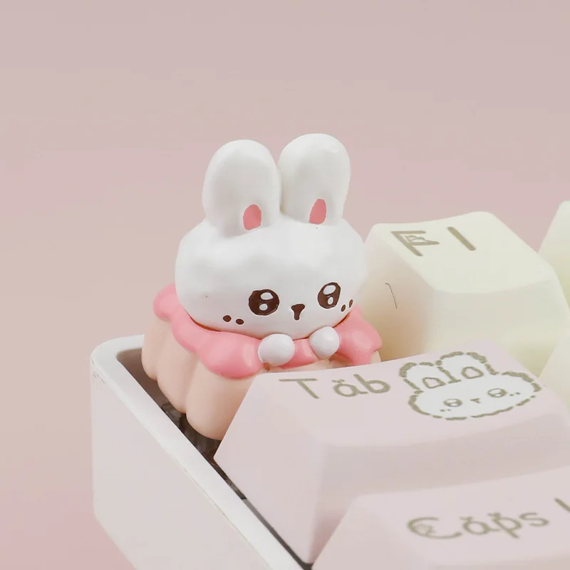 Handcrafted resin artisan keycap showcasing a whimsical Fabu Rabbit in a pastel strawberry pudding design, bringing adorable charm to your keyboard.