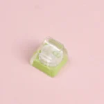 Whimsical handcrafted resin artisan keycap showcasing a cute melon and star dessert design, adding a unique, playful accent to any keyboard.