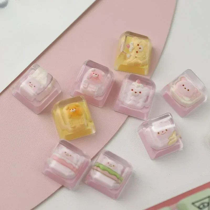 Profile view of a Bear Bread Transparent Keycaps, showcasing its adorable handcrafted details and vibrant, miniature pastry design for keyboard.