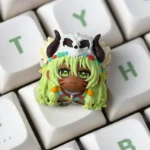 Close-up of a unique handcrafted tribal Matata artisan resin keycap for ESC, featuring vibrant earthy tones and exotic patterns, showcasing exquisite design.