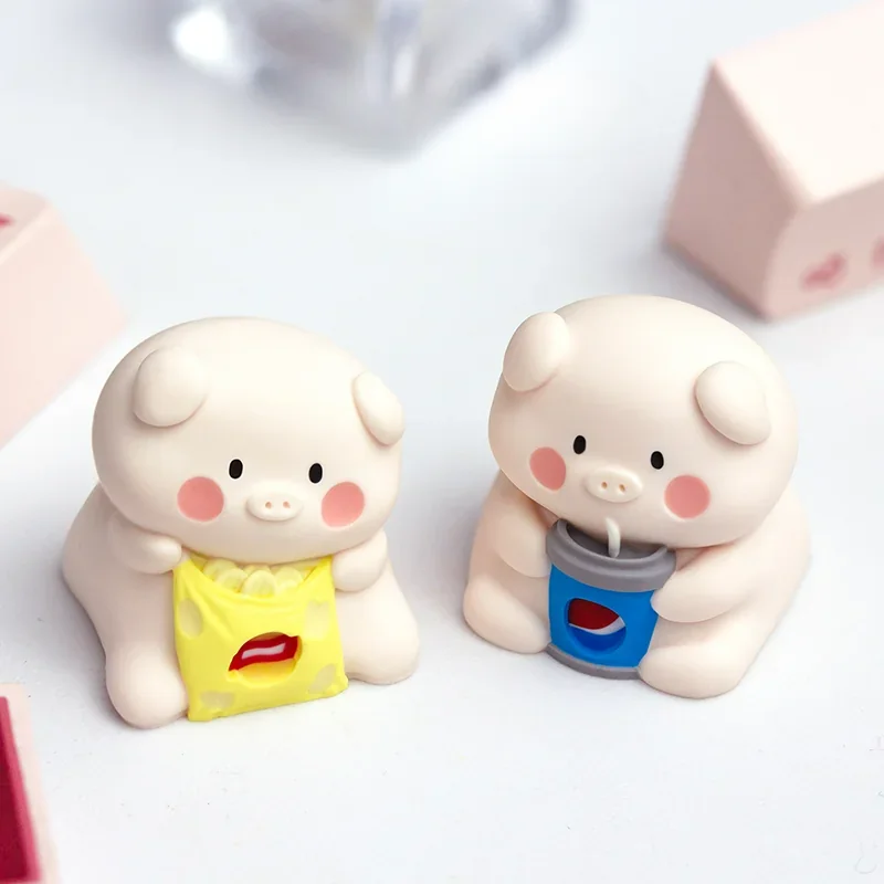 A playful handcrafted resin artisan keycap featuring a whimsical pig enjoying a snack, shown from multiple delightful angles, adding charm to any keyboard.