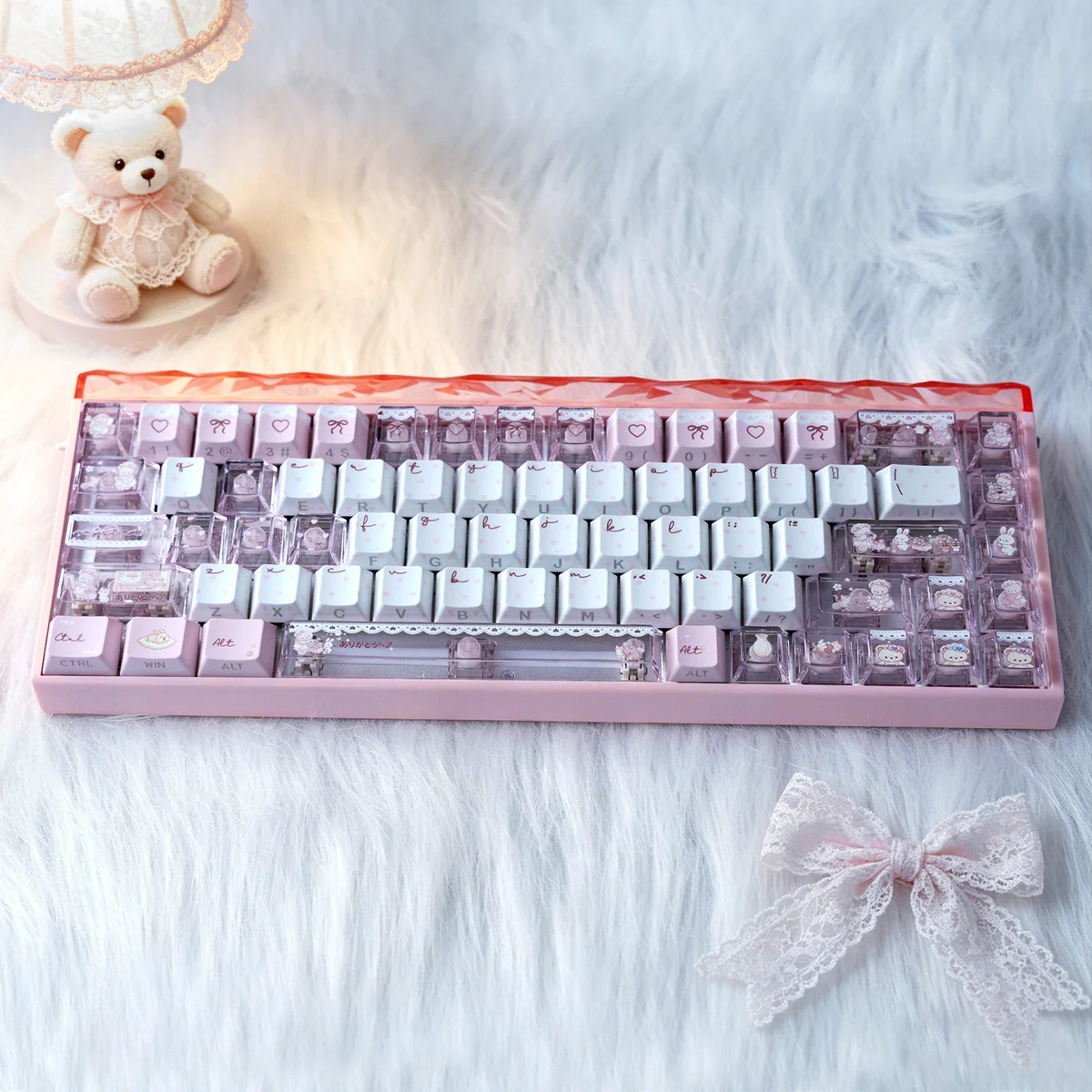 Close-up of the whimsical Bear Tea Party PBT keycaps set, showcasing pastel illustrated bears and charming tea party elements, highlighting the durable material.