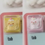 Birthday Bear Waffle Transparent Keycaps ESC, a handcrafted resin keycap featuring an adorable bear enjoying a colorful waffle dessert. A unique design.
