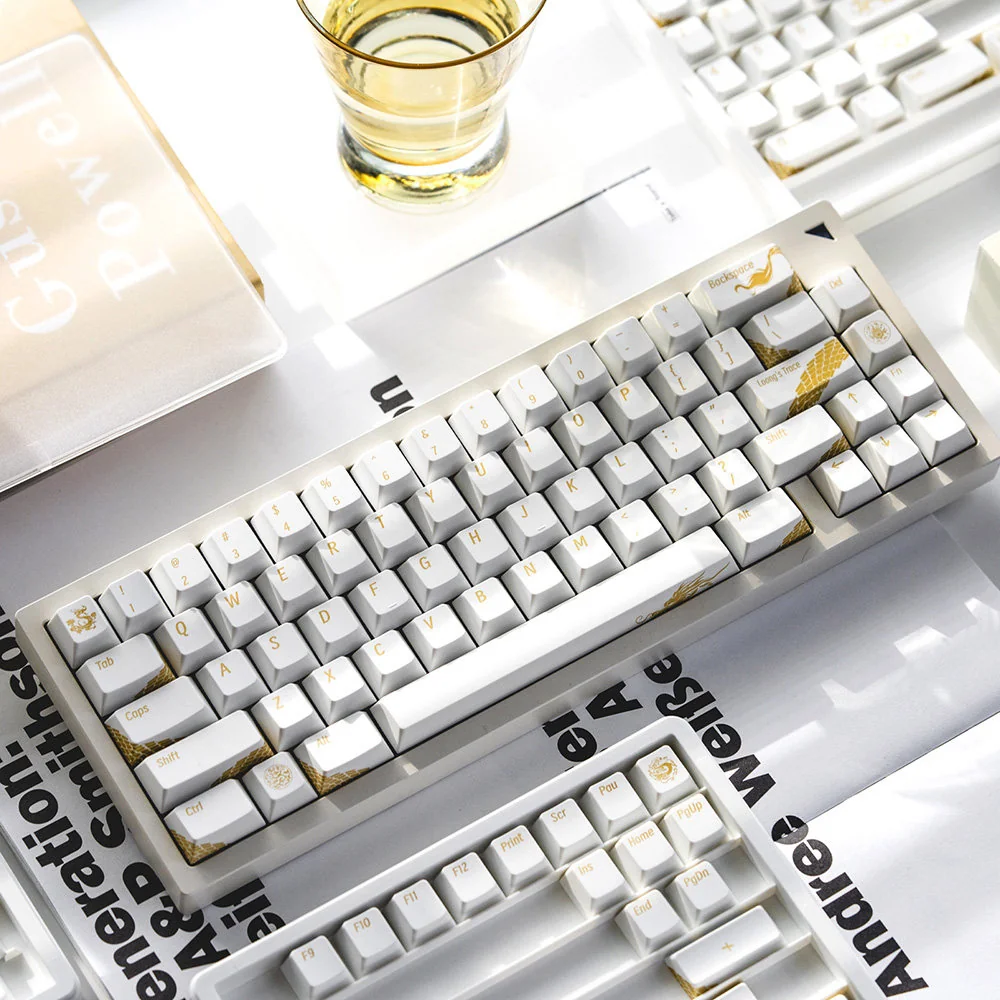 Dragon Keycap Set gallery: Monochromatic dragon shadows, intricately 3D printed with a skin-friendly tactile finish, shown from diverse angles.