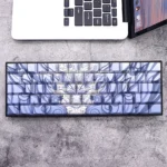 Premium blue backlit side-engraved durable PBT keycap set. Observe the clean aesthetic, bright backlit legends.