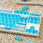 Vibrant blueberry jam PBT+PC keycap set, Cherry profile, showcased from various angles. Lush hues evoke a playful, ripe blueberry aesthetics.