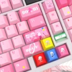 A vibrant collection of Bocchi the Rock! Hitori Gotoh PBT keycaps set, showcasing playful anime art and musical motifs from various angles, perfect for fans.
