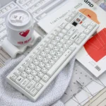 Premium Braun PBT Keycaps Set gallery: showcasing the unique irregular white texture and minimalist, vintage Braun-inspired design from multiple detailed.