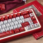 Elegant burgundy PBT keycap set, highlighting its premium PBT material and refined texture. Offers ergonomic comfort for a sophisticated desktop feel.