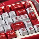 Refined texture of the premium burgundy PBT keycap set. Deep, elegant tones provide ergonomic comfort, enhancing a sophisticated desktop.