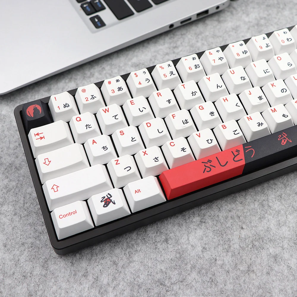 Bushido PBT Keycaps Set: multiple angles of dye-sublimated keycaps featuring elegant Japanese warrior motifs and crisp legends. A premium setup.